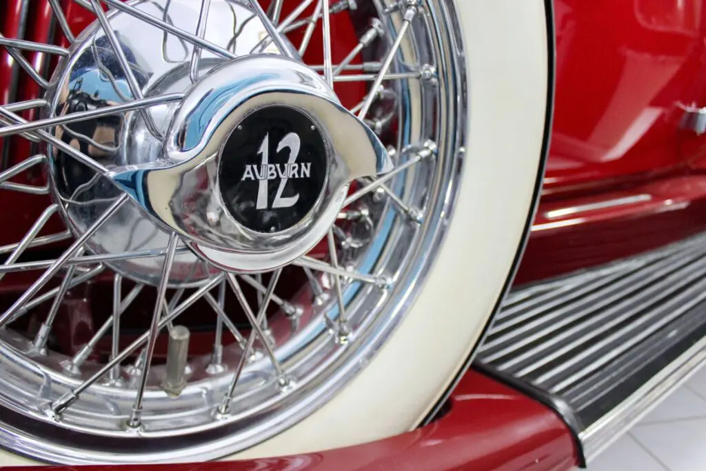 Close up of the spare wheel of a red Auburn V12