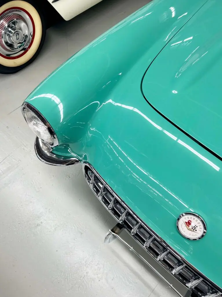 Stylized bird's eye view of a green Corvette
