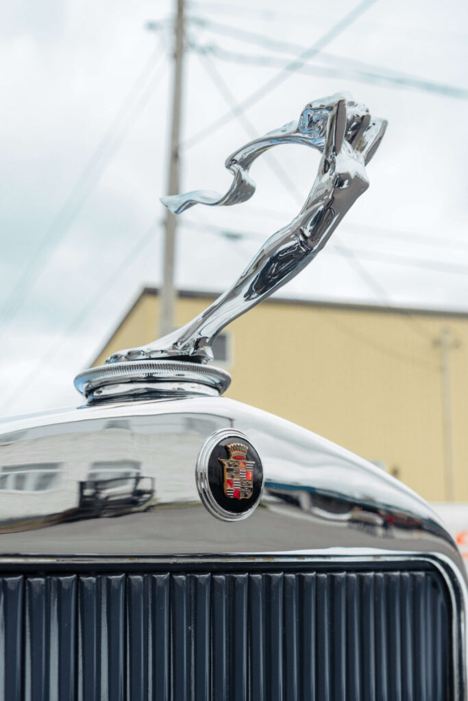 Close up of the mascot of a Cadillac 1928