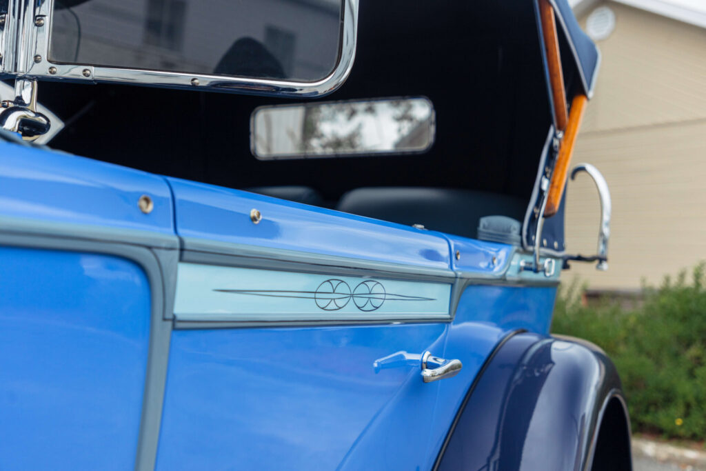 Close up of the side of a blue Cadillac V8 Dual Cowl Phaeton from 1928