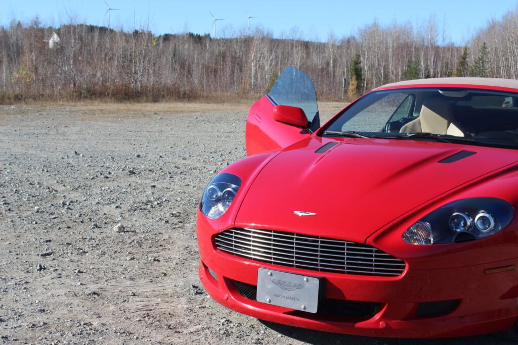 Aston Martin SB9 Volante with open passenger door. 