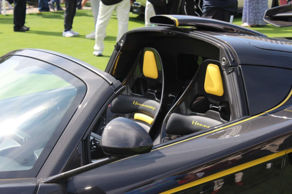 Close up of the two seats of a Henessy branded car.