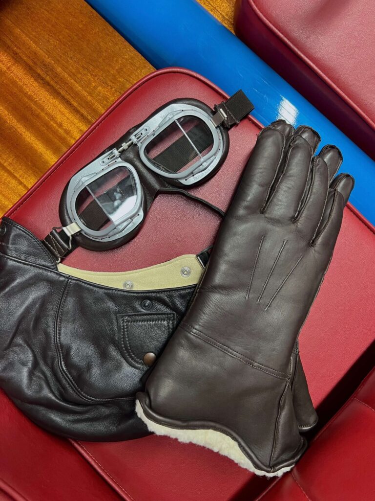 Racing goggles, gloves and helmet