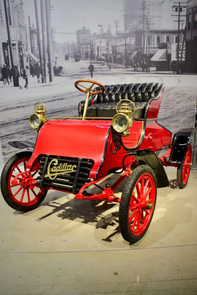 Red 1903 Model A Cadillac Runabout.