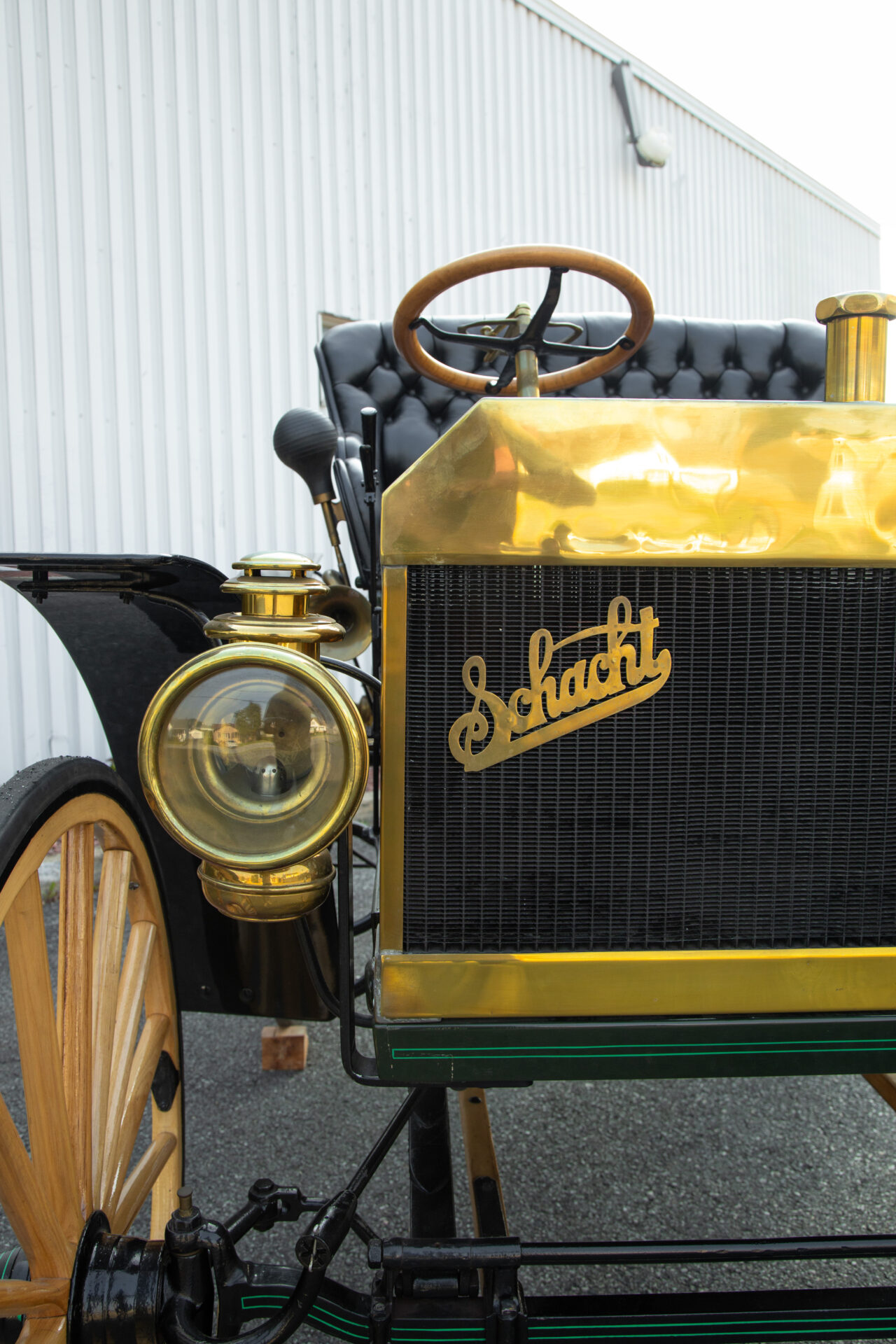 Close up of the front of the car. "Scacht" is written on the radiator in bronze.