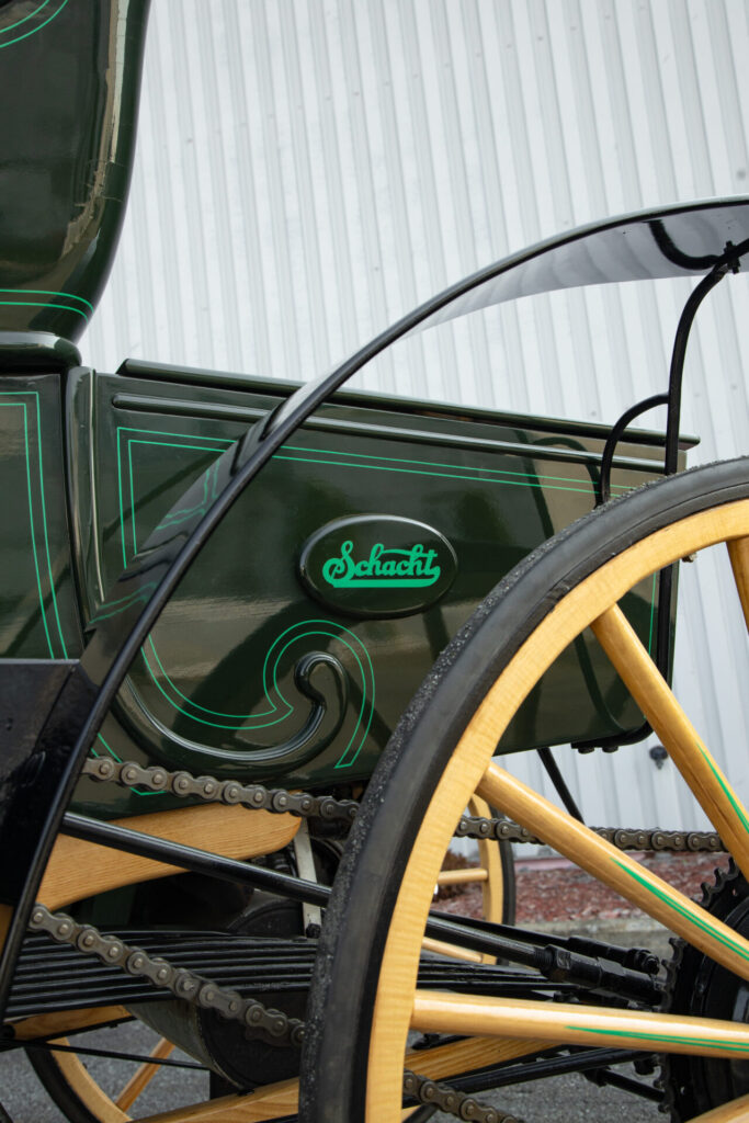 Schacht logo on the rear flank of the car. The word is written in light green.