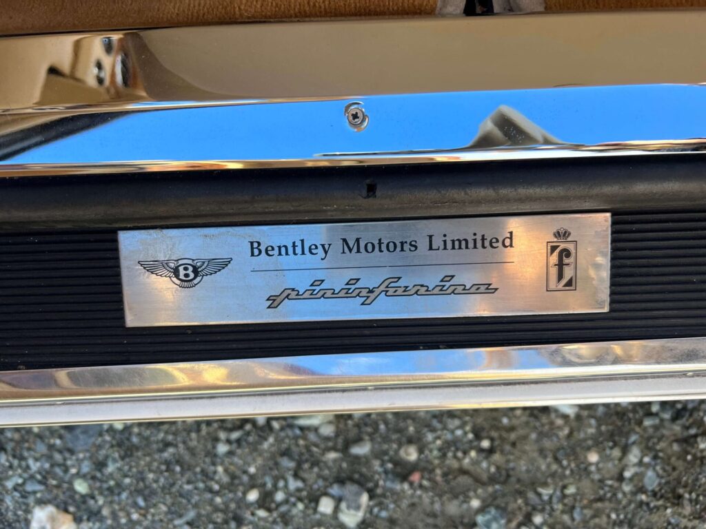 A Bentley and Pininfarina plot on the interior of a car.