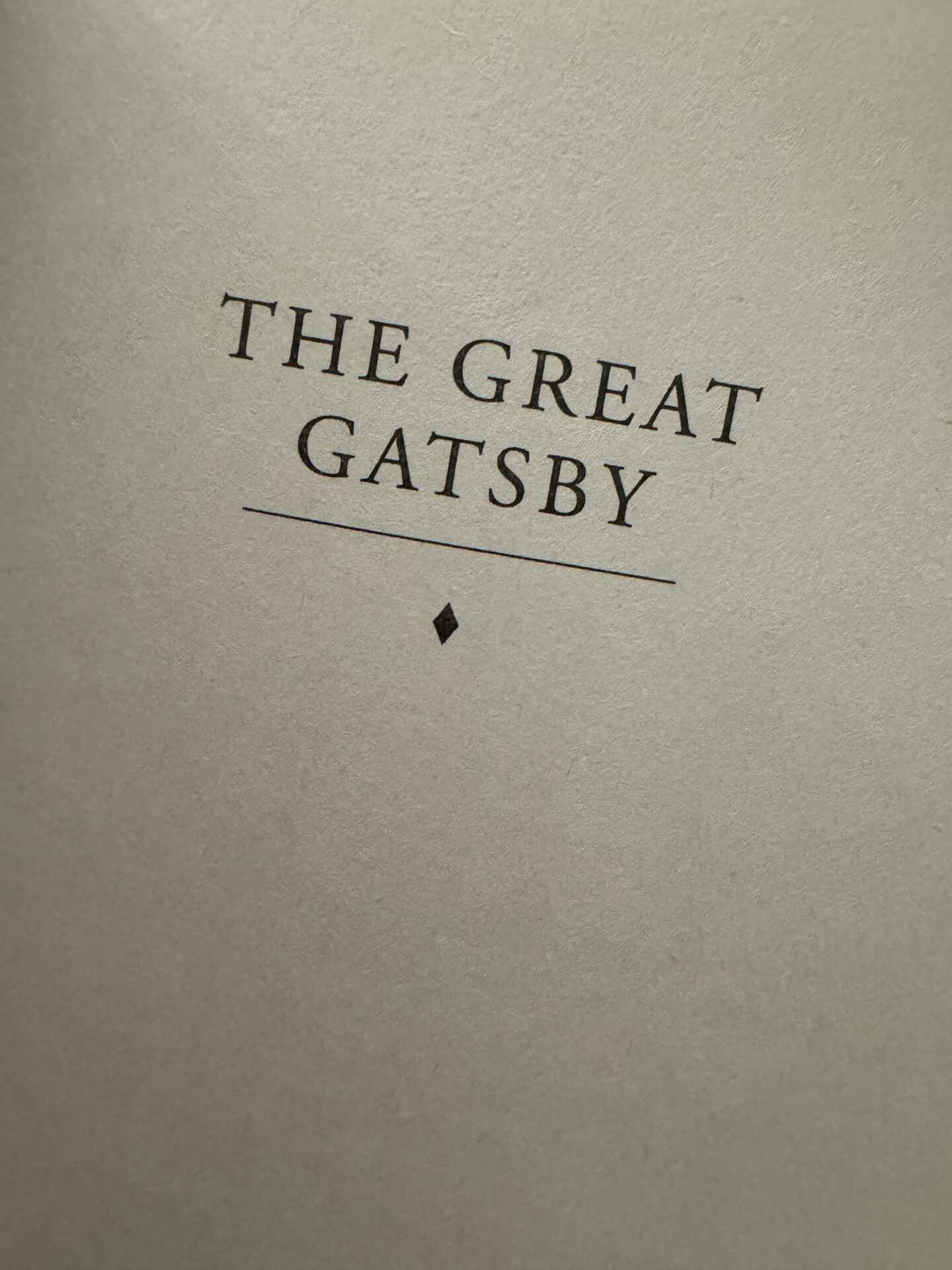 Printed words on a page spelling "The Great Gatsby"